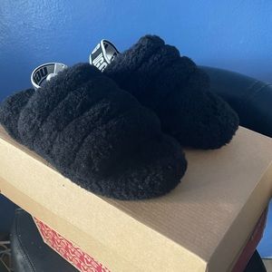 Used kids Ugg slippers on sale. In great condition. Black size 1 in kids
